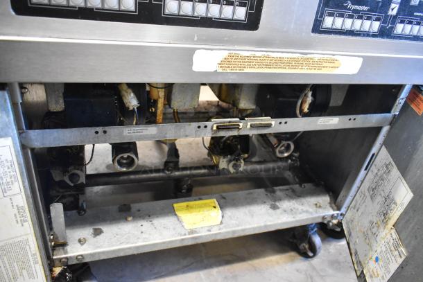 Frymaster PH255SC fryer, stainless steel, natural gas, 80,000 BTU, commercial casters, visible labels, used condition.