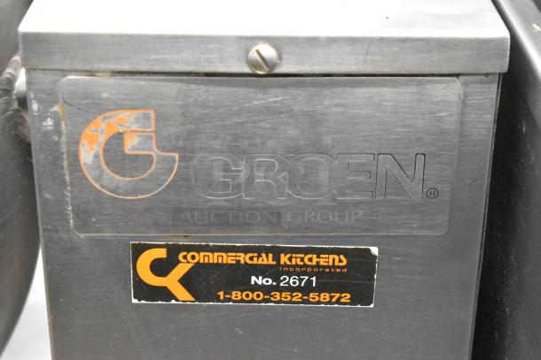 Groen stainless steel electric steam kettle, 208/240V, commercial use, visible wear. Labels: "Groen," "Commercial Kitchens Inc."