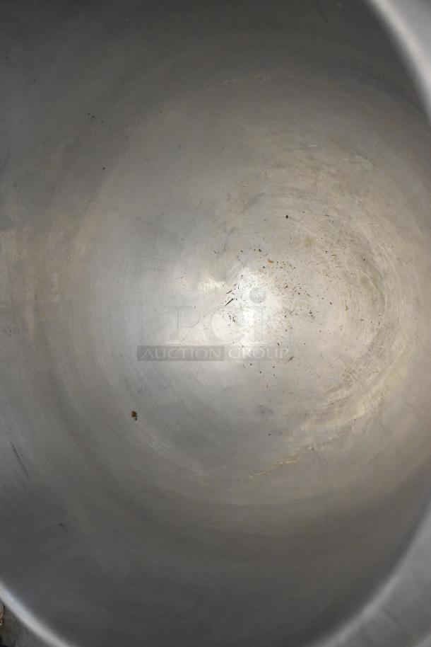 Groen stainless steel commercial electric steam kettle interior, showing minor wear. Designed for 208/240 volts.