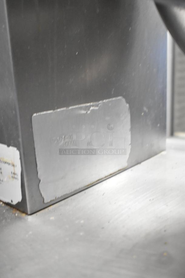 Groen stainless steel electric steam kettle, 208/240V, commercial grade, visible label with model and specifications.