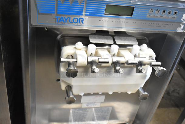 Taylor 337-27 stainless steel soft serve ice cream machine with 2 flavors and twist feature. Air cooled, 208-230V, 1 phase.