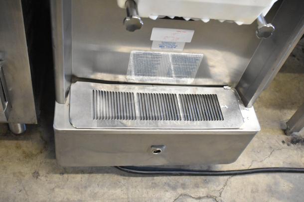 Taylor 337-27 stainless steel soft serve ice cream machine, air-cooled, 2-flavor with twist, 208-230V, commercial use.