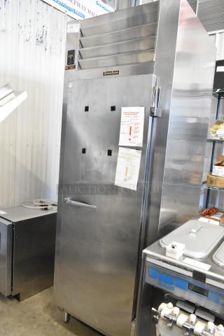 Traulsen RHT132WUT-FHS stainless steel commercial single door reach-in cooler, 115 volts, 1 phase, with temperature guide.