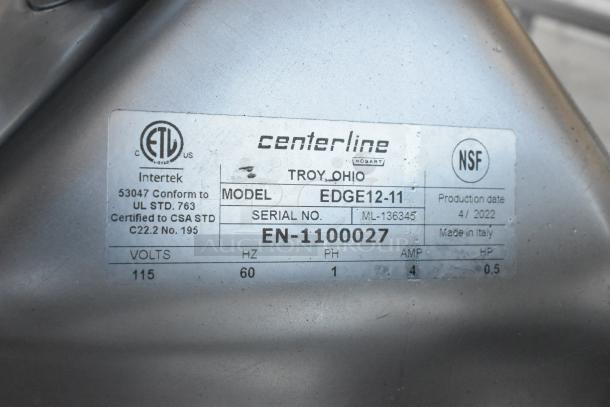 2022 Hobart EDGE12-11 stainless steel meat slicer label, showing model, serial number, and certification details.