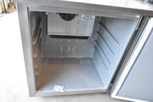 2020 Delfield 406P-STAR4 stainless steel undercounter cooler; single door; 115V, 1 phase; interior view; clean condition.