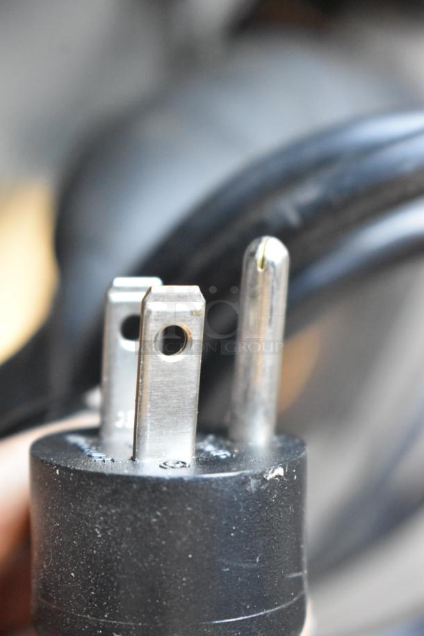 Close-up of a three-prong plug for the 2020 Delfield 406P-STAR4 undercounter cooler. 115 Volts, 1 Phase.