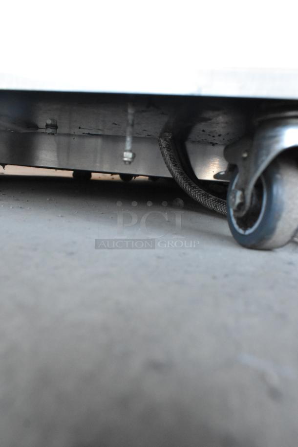 Stainless steel Jun-Air 87R-4MN1-HSBHH Nitro Brew Nitrogen Generator on commercial casters. 120V, 1 phase.