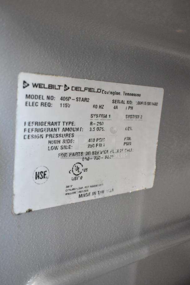 2020 Delfield 406P-STAR2 cooler label showing refrigerant type R-290, 115V, 60Hz, made in USA, NSF certified.