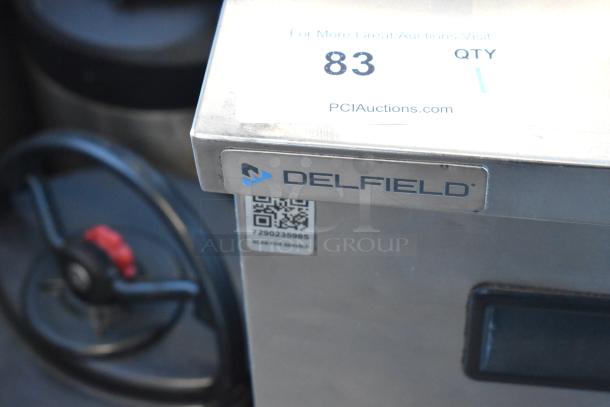 2020 Delfield 406P-STAR2 stainless steel undercounter cooler. Features Delfield branding, QR code for service, 115V, 1 phase.
