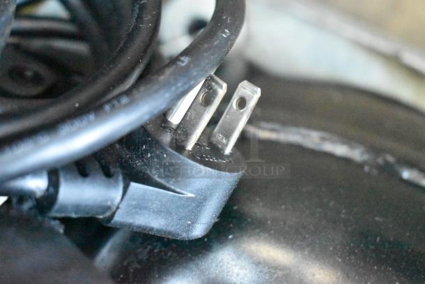 Close-up of power cord for 2020 Delfield 406P-STAR2 undercounter cooler, showing standard three-prong plug.