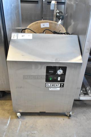 Stainless steel Jun-Air 87R-4MN1-HSBHH nitrogen generator on casters. Features "Element 7" label, control panel, 120V, 1 phase.
