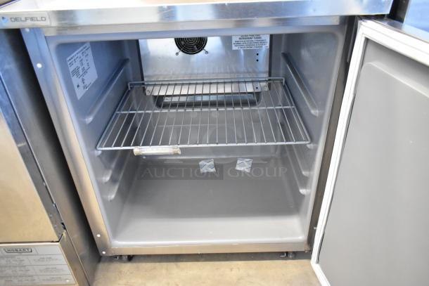 2022 Delfield 406P-STAR2 stainless steel undercounter cooler, single door, with commercial casters, 115V, shelf inside.