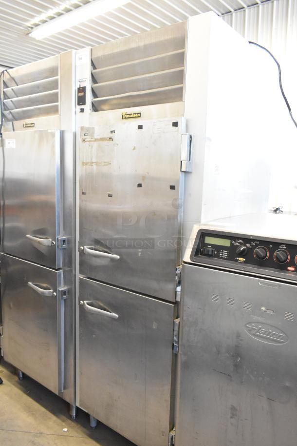 Traulsen G12000 stainless steel 2 half-size door commercial freezer with metal racks, 115 volts, 1 phase.