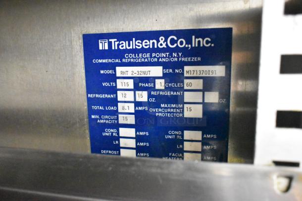 Traulsen RHT 2-32NUT cooler label showing model, serial number M171370191, 115V, 1 phase, and refrigerant specs.