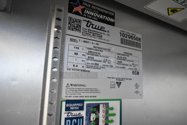 2021 True T-49DT-4-HC stainless steel freezer label, 115V, 1 Phase. Includes model, patent info, and safety warnings.