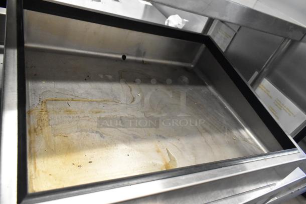 Metal bin with minor stains, used condition. Part of auction lot with a cutting board drying rack.