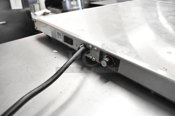 Hatco GRS-30-I metal heated shelf warmer, 120 volts, 1 phase, showing power switch and temperature dial on a stainless steel surface.