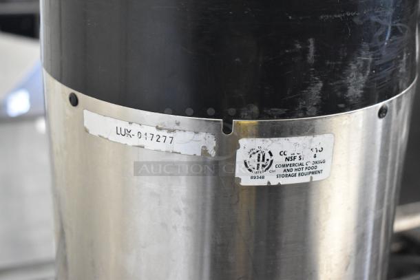 3 stainless steel beverage holders, NSF certified, model LUX-017277, commercial use, visible wear.