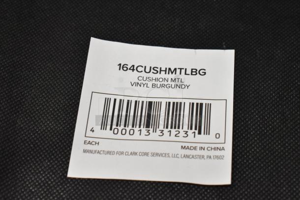 Label with barcode, "164CUSHMTLBG," "CUSHION MTL VINYL BURGUNDY," made in China, for Clark Core Services, Lancaster, PA.