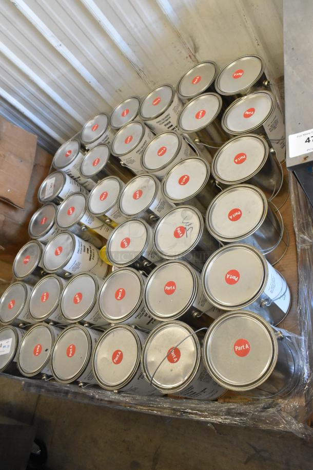 70 Pro Guard cans including 1519 Part A Proflex Primer and 9908 EPDM Super Pipe Seal. Pallet loaded, labeled "Part A."