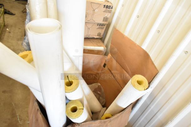 20 assorted tubes in a box, showing white and yellow insulation material, in good condition.