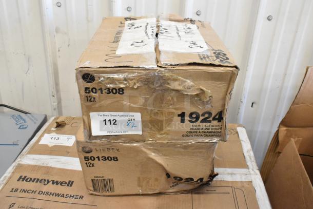 Two boxes of 12 Libbey 1924 4.75oz glasses, brand new, with minor box damage, missing four glasses. Auction lot 112.