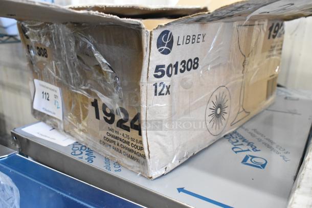 Two boxes of Libbey 1924 4.75oz wine/cocktail glasses, each originally 12, now 8 glasses per box, scratch and dent condition.