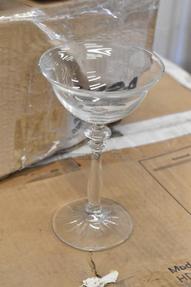 Boxes of 20 new Libbey 1924 4.75oz wine/cocktail glasses, scratch and dent condition, missing four glasses.