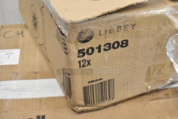 Two boxes of Libbey 1924 4.75oz wine/cocktail glasses, new scratch and dent condition. Box labeled with "Libbey" and "501308."