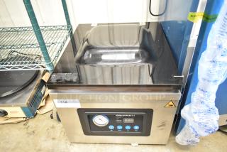VacPak-It stainless steel commercial countertop vacuum sealer, brand new with minor scratches and dents, labeled model with controls.