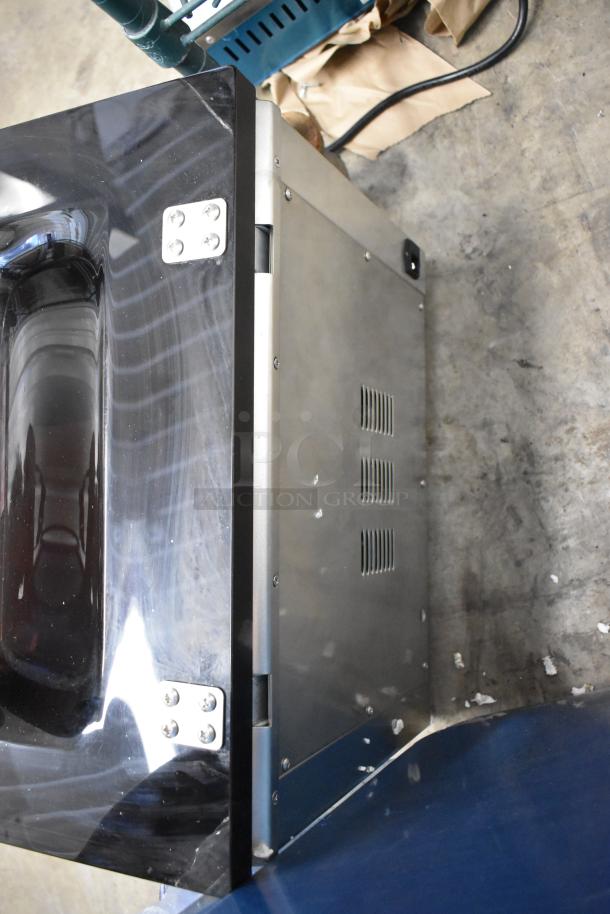 VacPak-It stainless steel commercial countertop vacuum sealer, brand new with cosmetic scratches, durable design.