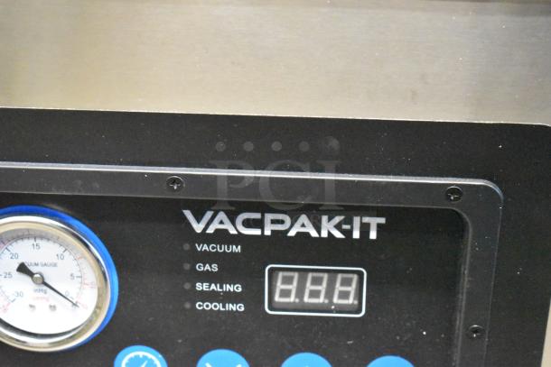 Brand new VacPak-It stainless steel commercial vacuum sealer, countertop model, with control panel and vacuum gauge.