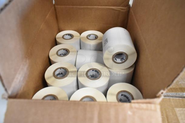 Three boxes containing Zebra label rolls, cushions, and phone set, offering three times your bid value.