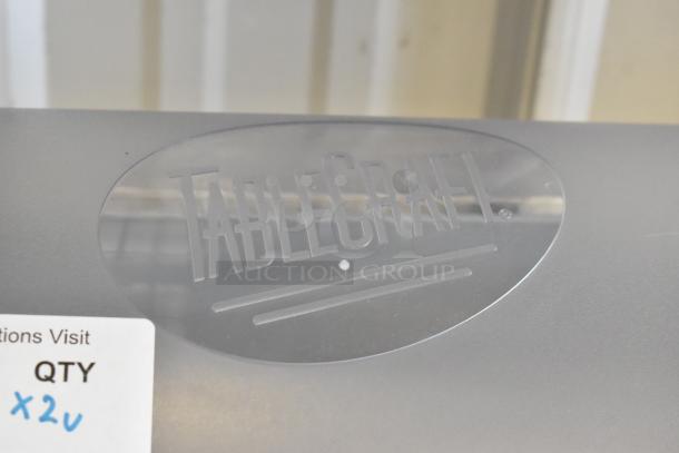 TableCraft paper product roll dispenser with logo, shown with quantity tag indicating "x2." Includes blender pitcher.