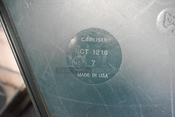 Carlisle NCT 1216 poly food tray, NSF certified, made in USA. Features visible markings; good condition. Auction includes 36 trays.