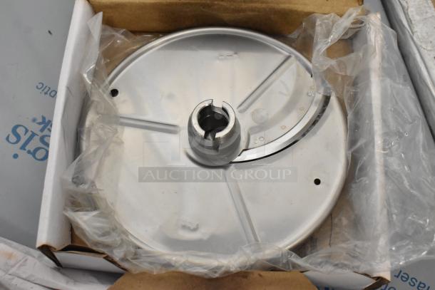 AvaMix food processor blades in box; includes continuous feed head, grating, and slicing blade. New condition.