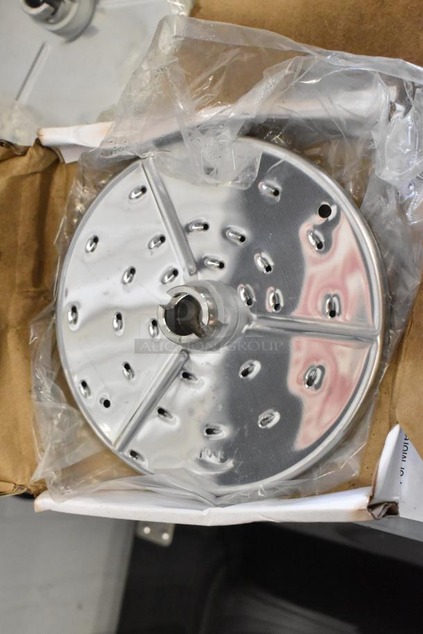 AvaMix food processor items: continuous feed head, grating blade, slicing blade in packaging. New condition.