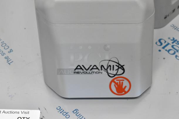 AvaMix continuous feed head with "Revolution" logo and safety warning, part of 3 food processor items including grating and slicing blades.