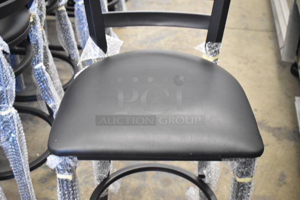 12 new Lancaster black ladder back bar chairs with scratch and dent. Includes black seat cushion.