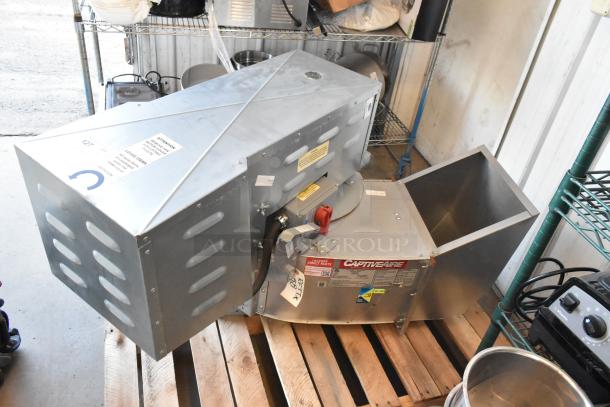 Brand new 2021 CaptiveAire CASRE13BD metal commercial power ventilator, industrial exhaust fan, silver finish, shown on wooden pallet.