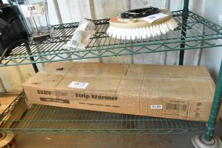 Brand new ServIt 423SW36TLHA 36" lighted strip warmer in box. Single toggle control, 120V, scratch and dent condition.