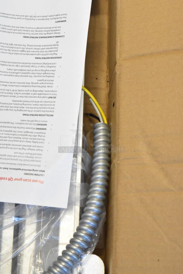 Brand new ServIt 423SW36TLHA 36" Lighted Strip Warmer, 120V, 1 Phase, with single toggle control in original packaging, minor box wear.