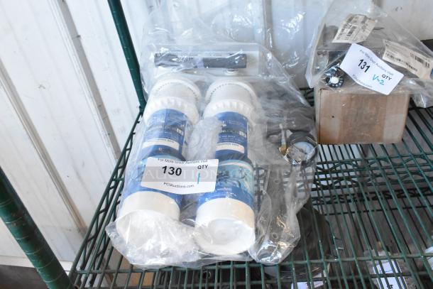 BRAND NEW 790OCLOKITL2 C Pure Oceanloch+ L2 Dual Water Filtration System, Oceanloch+ L2 cartridges, outlet pressure gauge, 1 micron, 3.34 GPM, packaged with labels.