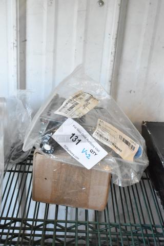 Alt Text: "New Avantco 177KNOBTAGCS knob for Chef Series CAG griddles and RV48L gas hookup piece, in packaging with labels."