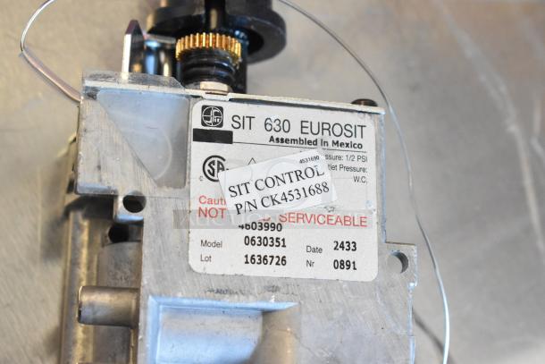 New Avantco 177KNOBTAGCS knob and RV48L gas hookup piece. SIT 630 EUROSIT control unit with label for Chef Series Griddles.