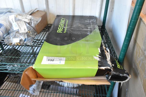 Brand new Regency 600PRD8X faucet in original packaging. Box shows wear with scratches and dents. Tags indicate auction item #132.