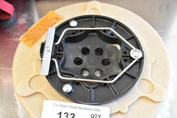 Brand new scratch and dent floor cleaning brush, plastic and metal components, visible labels, minor surface marks.