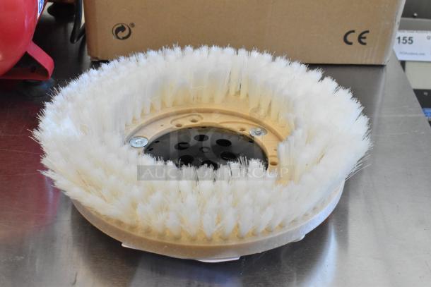 Brand new floor cleaning brush, minor scratches, dense white bristles, sturdy base, ideal for efficient floor cleaning.