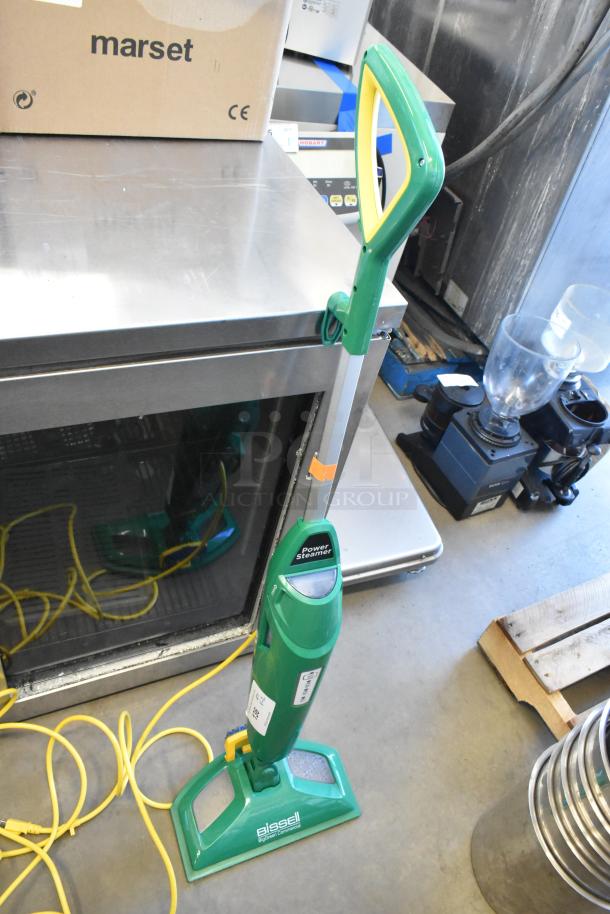 Brand new Bissell BGST1566 BigGreen Commercial Power Steamer, 115 volts, showing minor cosmetic scratches.