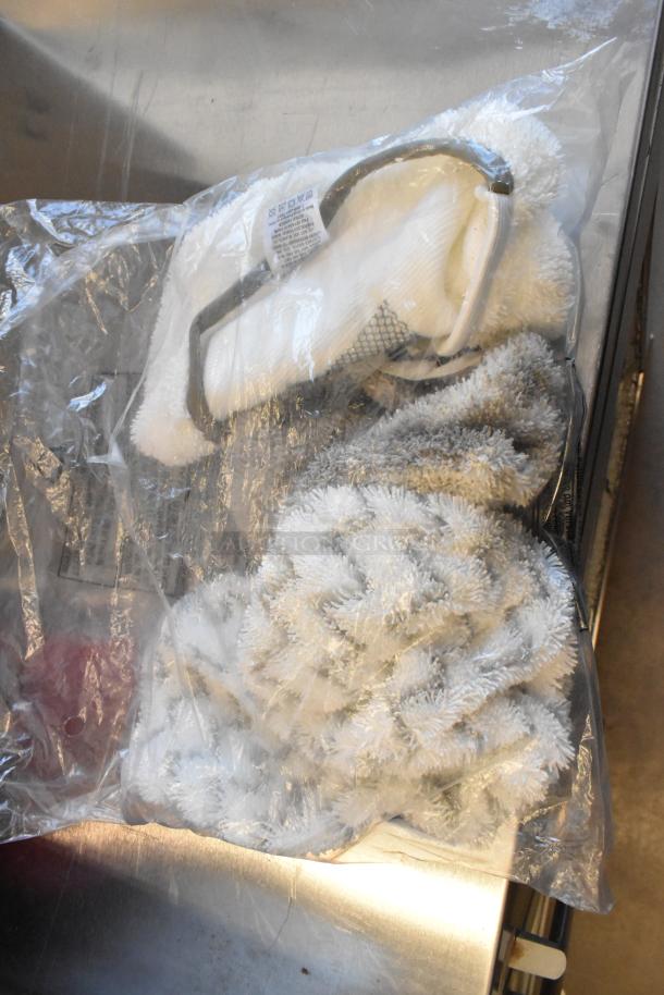 Brand new Bissell BGST1566 BigGreen Power Steamer in packaging. Includes attachments, 115 volts, 1 phase, scratch and dent condition.